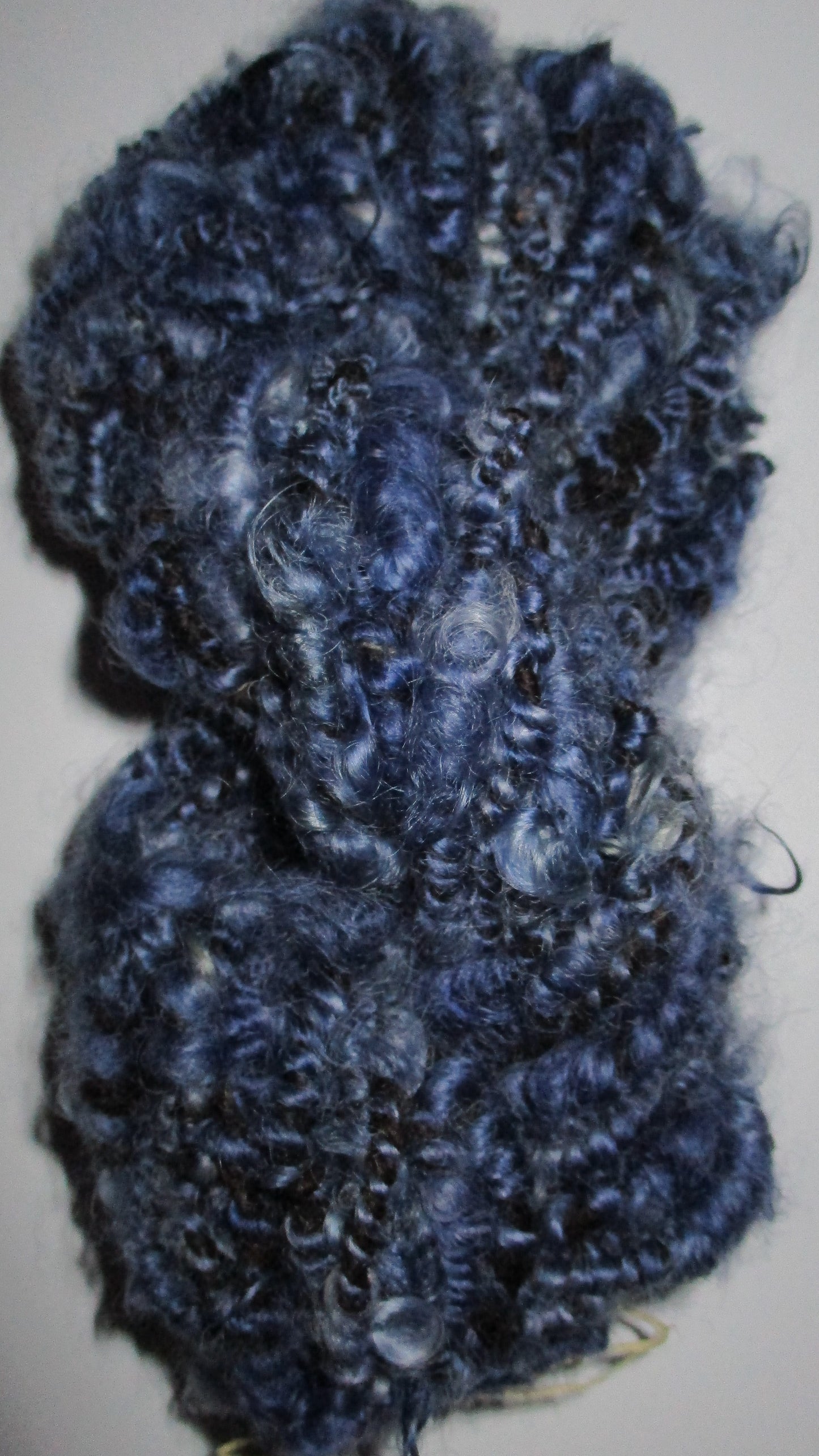 Coiled Wensleydale Doll hair yarn in Blue Denim
