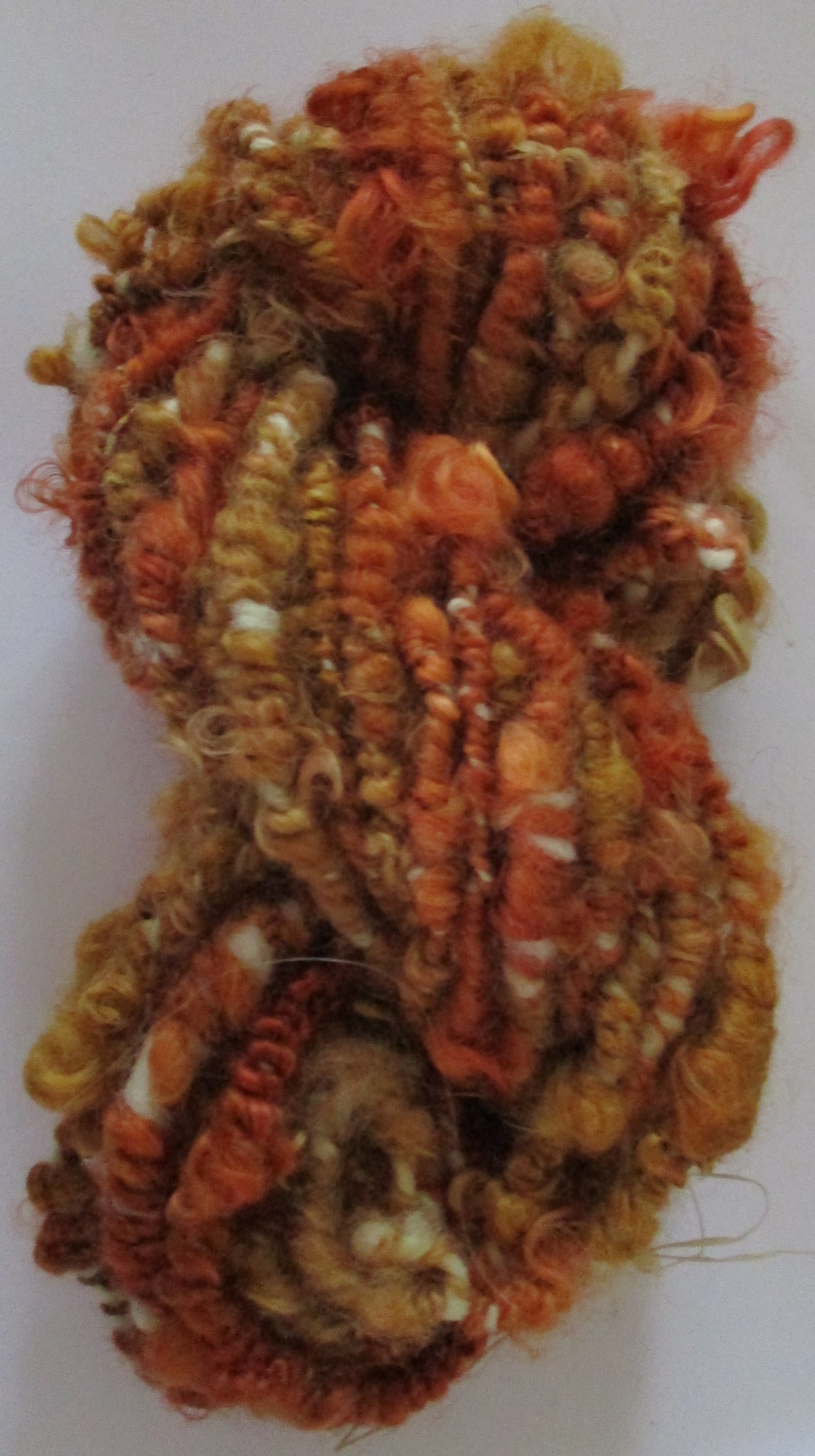 Coiled Wensleydale Doll hair yarn in Toffee Gold